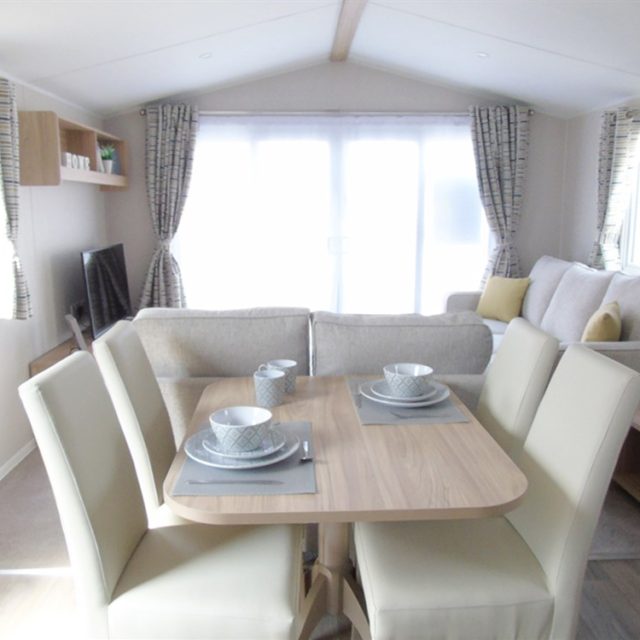 https://bulmerleisure.co.uk/wp-content/uploads/2021/06/1-480-1-20232-1-2021-Willerby-Brenig-Outlook-static-caravan-holiday-home-lounge-overview-640x640.jpg